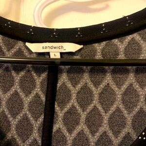 Classy black dress . Sandwich mark